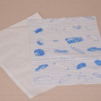 Halványszürke fóliázott húscsomagoló papír kék színű hús mintával - 60x40 cm / 15 kg